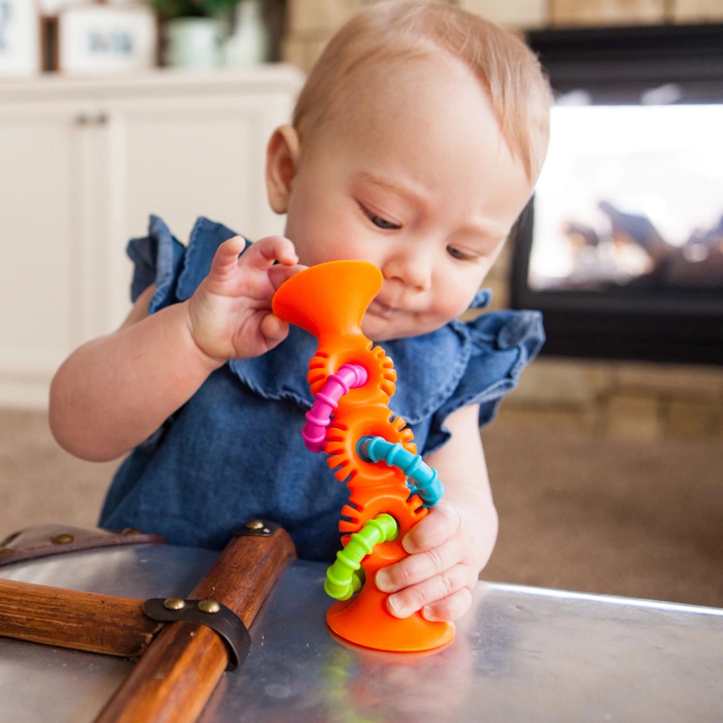 Pip Squigz Loop™ Naranjo, mordedor y sonajero sensorial 6m+