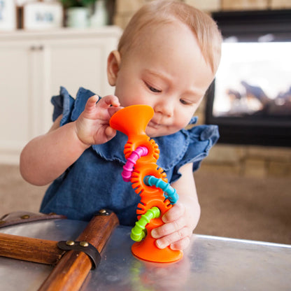 Pip Squigz Loop™ Naranjo, mordedor y sonajero sensorial 6m+