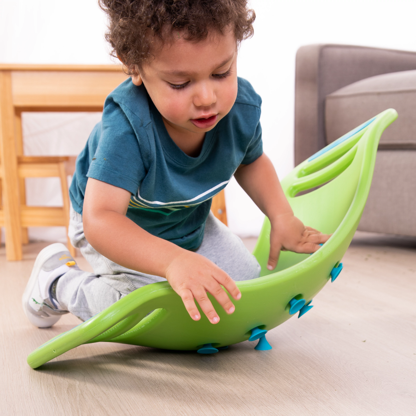 Teeter Popper™ Verde. Juego de habilidades motoras 3 años +