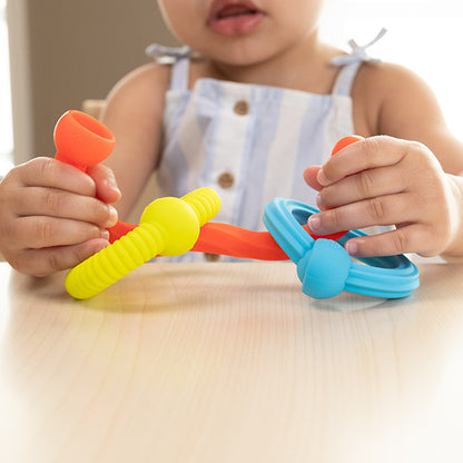 Plip Grips. ¡Agarra, tira y POP!. 6 meses +