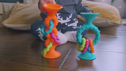 Pip Squigz Loop™ Naranjo, mordedor y sonajero sensorial 6m+